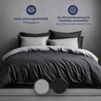 Schwarzes Wendebettwäsche-Set mit grauer Rückseite, beidseitig verwendbar, atmungsaktiv und pflegeleicht.